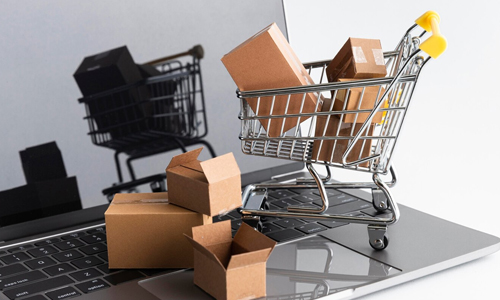 Small-cart-and-packing-cubes-on-a-laptop