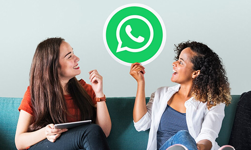 Two women and whatsapp icon in between them