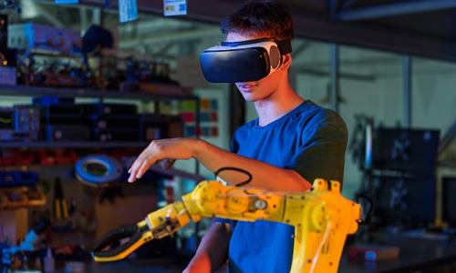 Boy-doing-robotic-experiment