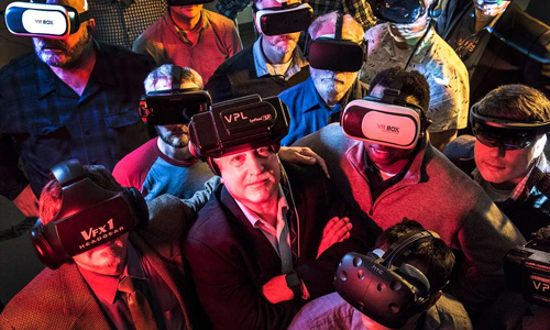 group of men wearing VR headsets