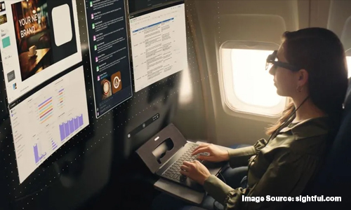 Woman using AR laptop