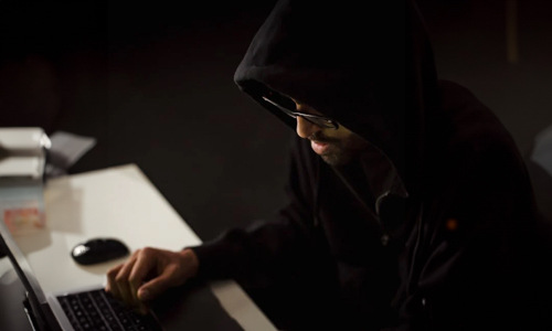 Man-wearing-black-hoodie