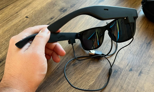 Person-holding-AR-glass