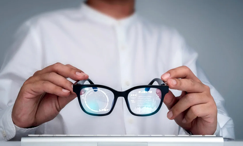 person-holding-AR-Glasses